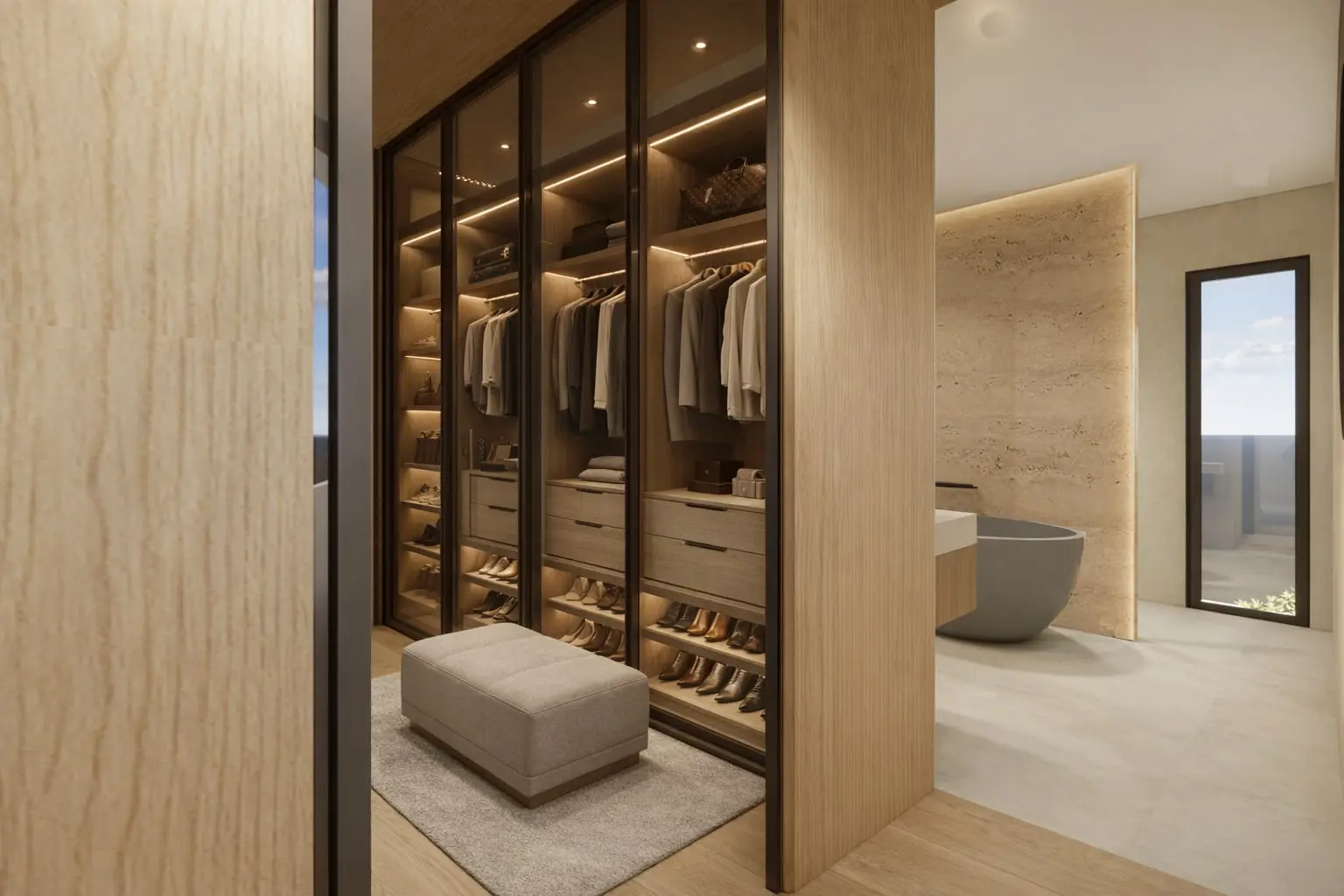 Dressing sur mesure en bois clair avec éclairage intégré, suite parentale de la Villa G.